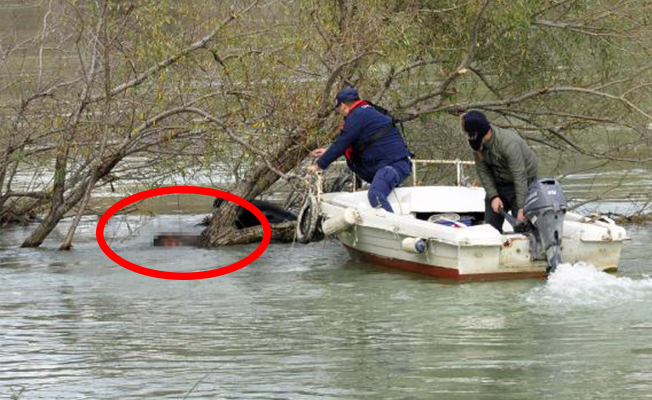 Irmakta cesedi bulunan oğlunu dövmesinden teşhis etti