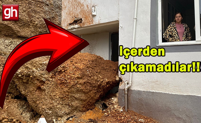 Aşırı yağış sebebiyle kopan kaya parçası evin kapısına çarptı