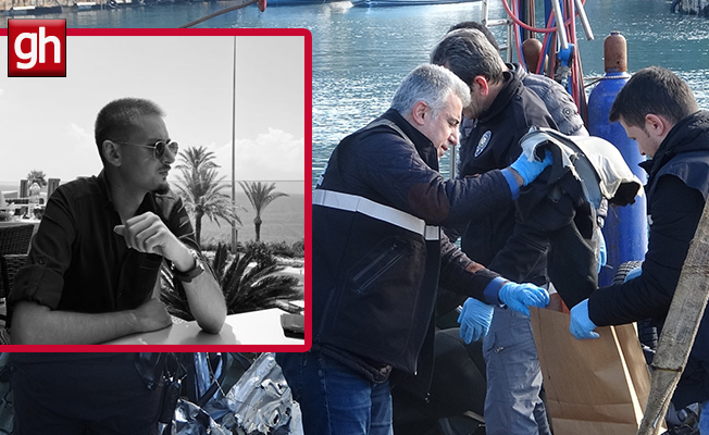 Araçtan çıkan ve kayıp gence ait olduğu değerlendirilen kıyafet delil torbasına konuldu