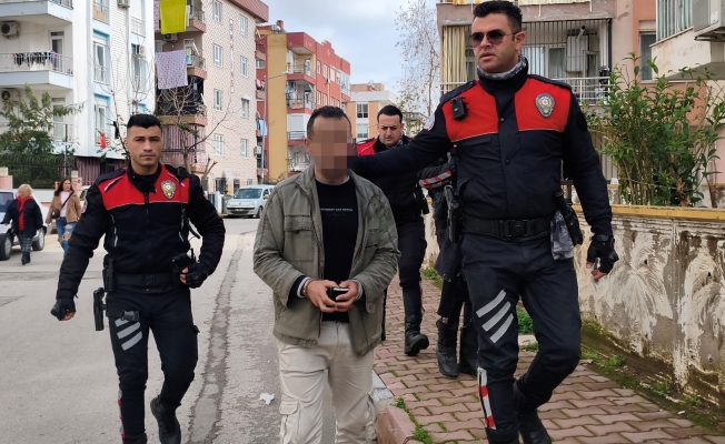 Apartman bahçesine sakladığı pompalı tüfek polisi alarma geçirdi