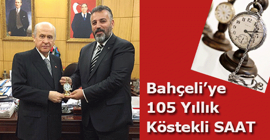 Bahçeli'ye 105 yıllık köstekli saat hediye etti