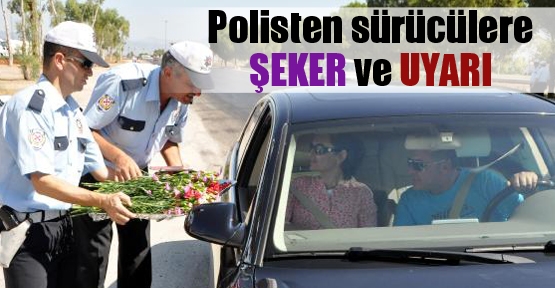 Polisten sürücülere şeker ve uyarı