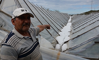Alanya’da dolu yağışında seraları zarar gören üreticiye naylon desteği verilecek