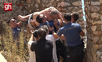 Dolandırıldığını söyleyip kalenin surlarına çıktı, polise ecel terleri döktürdü