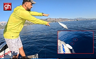Eşiyle birlikte balık tutan balıkçının zor anı!