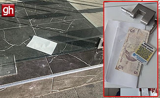 Antalya’da sabah dükkanını açan esnaf, kapıya konan siftah zarfıyla şaşırdı