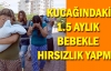 Kucağındaki 1.5 aylık bebekle hırsızlık yapmış