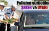 Polisten sürücülere şeker ve uyarı