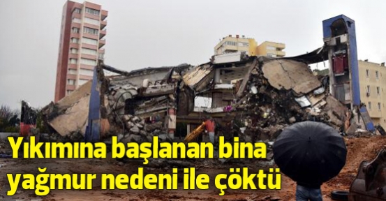 Yıkımına başlanılan bina yağmur nedeniyle çöktü
